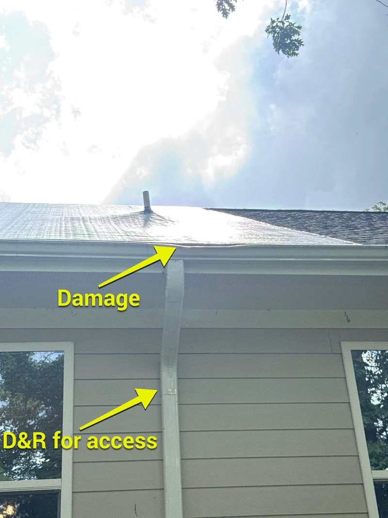Storm damage to a gutter line, arrowed on the photo that went to the carrier