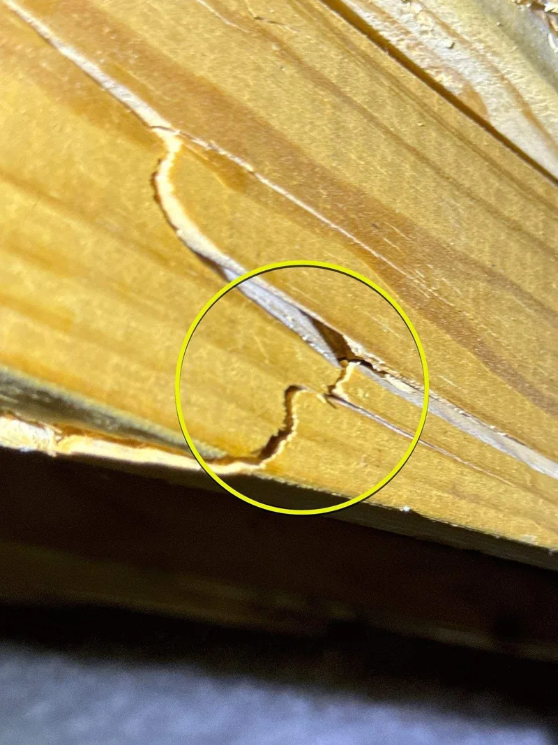 A cracked truss circled in the claim file